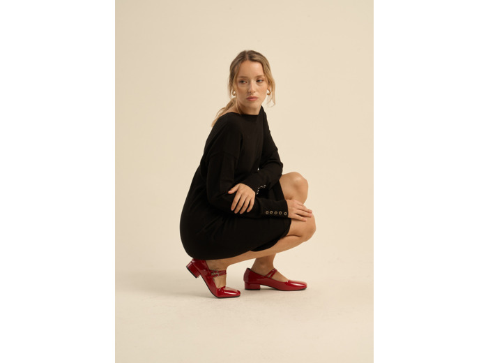 Pull à poignets boutonnés