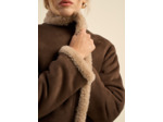 Blouson en fausse fourrure peau lainée