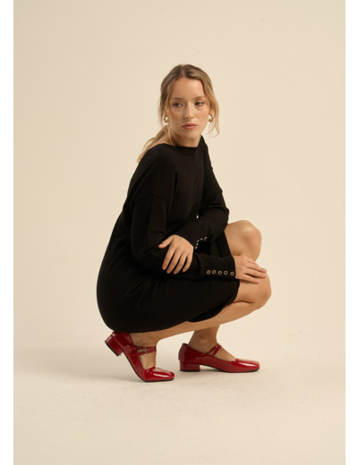 Pull à poignets boutonnés