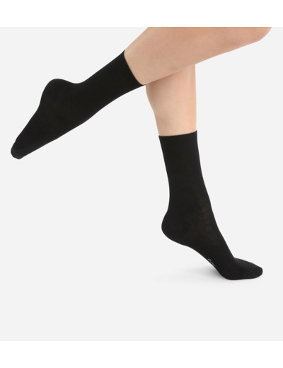 Chaussettes unies noires en laine douce Femme